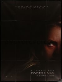 5w1154 INVISIBLE MAN teaser French 1p 2020 close up of scared Elisabeth Moss in the shadows!