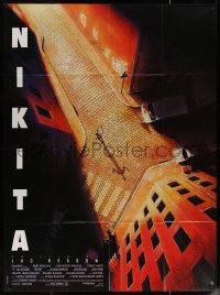 5w1267 NIKITA French 1p 1990 Luc Besson, overhead art of Anne Parillaud in alley, La Femme Nikita!