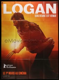 5w1197 LOGAN teaser French 1p 2017 Jackman in the title role as Wolverine holding Dafne Keen!