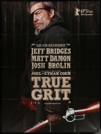 5w1406 TRUE GRIT teaser French 1p 2010 great image of Jeff Bridges as Rooster Cogburn with rifle!