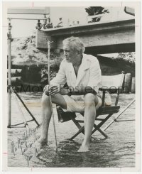 5y0498 JOHN HUSTON signed TV 8x10 still 1964 candid portrait on chair in the middle of a stream!