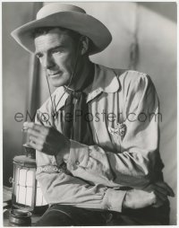 5z0324 WESTERN UNION 10.5x13.5 still 1941 great seated smoking portrait of cowboy Randolph Scott!