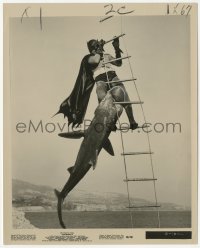 6c0918 BATMAN 8.25x10 still 1966 great image of shark attacking Adam West in costume on ladder!