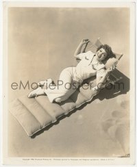 6c0991 CLAUDETTE COLBERT 8.25x10 still 1940 overhead relaxing on the sands of the Pacific coast!