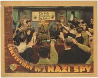 6c0369 CONFESSIONS OF A NAZI SPY LC 1939 crowd salutes German George Sanders behind desk, rare!