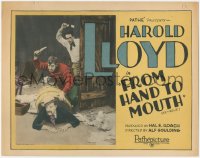 6c0064 FROM HAND TO MOUTH TC R1920s Hal Roach, wacky image of comedian Harold Lloyd about to hit guy!