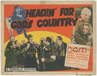 6c0081 HEADIN' FOR GOD'S COUNTRY TC 1943 close up of William Lundigan surrounded by angry mob!