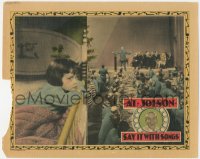 6c0692 SAY IT WITH SONGS LC 1929 split image of Al Jolson performing on stage & Davey Lee in bed!