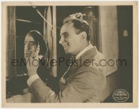 6c0789 WHEN THE CLOUDS ROLL BY LC 1919 Douglas Fairbanks combing his hair with broken mirror, rare!