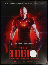 6g0788 BLOODSHOT teaser French 1p 2020 cool image of Vin Diesel in the title role with two guns!