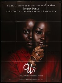 6g1482 US French 1p 2019 directed by Jordan Peele, creepy image of Lupita Nyong'o with mask!