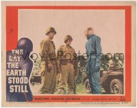 6m0083 DAY THE EARTH STOOD STILL LC #4 1951 Michael Rennie as Klaatu in full uniform by soldiers!