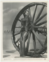 6w0232 IDA LUPINO 8x10.25 still 1943 full-length in cool sequin dress posing by giant wagon wheel!