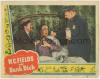 6w0788 BANK DICK LC 1940 W.C. Fields puts ping pong ball-sized medicine in Franklin Pangborn's mouth