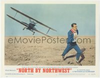 7a0470 NORTH BY NORTHWEST LC #6 R1966 Hitchcock, classic c/u of Cary Grant chased by crop duster!