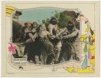 7a0477 THREE AGES LC 1923 Buster Keaton pulls girl away from cavemen, cartoon dinosaur in border!