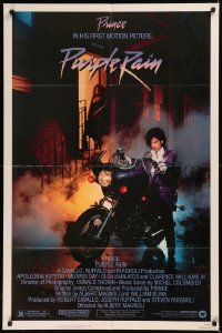 7d1096 PURPLE RAIN 1sh 1984 great image of Prince riding motorcycle, in his first motion picture!