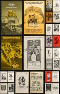 7f0299 LOT OF 30 UNCUT PRESSBOOKS 1970s advertising a variety of different movies!