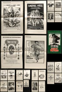 7f0300 LOT OF 29 UNCUT PRESSBOOKS 1970s advertising a variety of different movies!