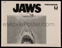 7h1252 JAWS pressbook 1975 art of Steven Spielberg's classic man-eating shark attacking swimmer!