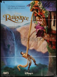 7j1500 TANGLED French 1p 2010 Walt Disney, cool image of her grabbing Flynn with her hair!