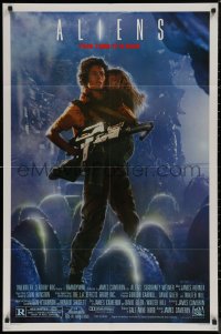 7p0356 ALIENS 1sh 1986 James Cameron sci-fi sequel, Sigourney Weaver as Ripley carrying Carrie Henn!
