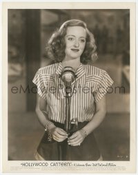 7r0256 HOLLYWOOD CANTEEN 8x10.25 still 1944 c/u of Bette Davis with striped shirt by microphone!
