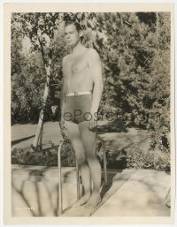 7r0294 JOHNNY WEISSMULLER 7.75x10.25 still 1936 in bathing suit by his pool, making Tarzan Escapes!