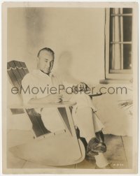 7r0582 WILLIAM BOYD 8x10.25 news photo 1929 at home in rocking chair before making His First Command!