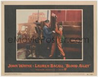 7r0916 BLOOD ALLEY LC #2 1955 c/u of big John Wayne fixing paddle ship, directed by William Wellman!