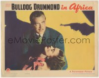 7r0938 BULLDOG DRUMMOND IN AFRICA LC 1938 detective John Howard holding unconscious Heather Angel!