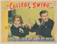 7r0990 COLLEGE SWING LC 1938 George Burns & Gracie Allen snapping each other with rubber bands!