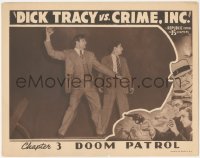 7r1025 DICK TRACY VS. CRIME INC. chapter 3 LC 1941 c/u of Ralph Byrd throwing dynamite, Doom Patrol!
