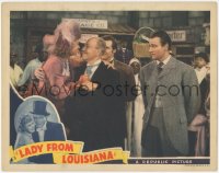 7r1221 LADY FROM LOUISIANA LC 1941 John Wayne in suit and tie watches Ona Munson & Henry Stephenson!