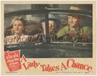 7r1227 LADY TAKES A CHANCE LC 1943 John Wayne driving car with Jean Arthur & Charles Winninger!