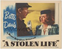 7r1469 STOLEN LIFE LC 1946 close up of Bette Davis with hat & gloves staring at Walter Brennan!
