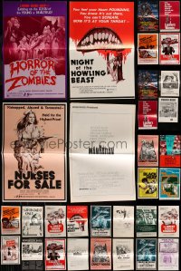 7s0301 LOT OF 35 UNCUT PRESSBOOKS 1970s great advertising for a variety of different movies!