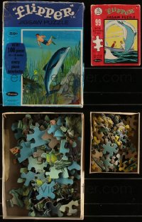 7s0681 LOT OF 2 FLIPPER JIGSAW PUZZLES 1964 great art of the famous dolphin from television!