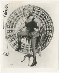 7w0997 MARLENE DIETRICH signed 8x10 REPRO still 1980s posing by Big Six wheel from Rancho Notorious!