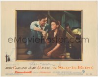 7w0152 STAR IS BORN signed LC #6 1954 by James Mason, great close up holding Judy Garland's hand!