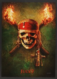 7x0016 PIRATES OF THE CARIBBEAN: DEAD MAN'S CHEST teaser jumbo WC 2006 image of skull between torches