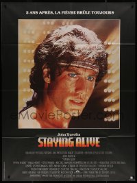 7y1226 STAYING ALIVE French 1p 1983 super close up of John Travolta in Saturday Night Fever sequel!