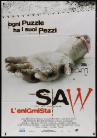 7y0647 SAW Italian 1p 2004 gruesome close up image of severed arm, every puzzle has its pieces!