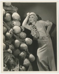 8k0305 MYSTERY OF THE WAX MUSEUM 8x10 news photo 1933 Glenda Farrell leaning on a tower of skulls!
