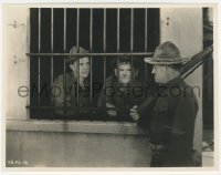 8k0331 PACK UP YOUR TROUBLES 7.75x10.25 still 1932 Stan Laurel & Oliver Hardy in jail by guard!