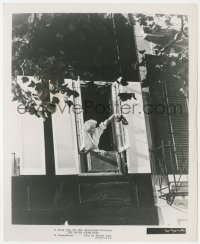 8k0382 SEVEN YEAR ITCH 8.25x10 still 1955 classic image of Marilyn holding shoes out her window!