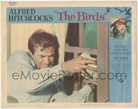 8k0800 BIRDS LC #6 1963 Hitchcock, close up of Rod Taylor trying to keep them from coming in window!