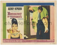 8k0811 BREAKFAST AT TIFFANY'S LC #1 1961 George Peppard carries Audrey Hepburn over his shoulder!