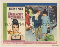 8k0814 BREAKFAST AT TIFFANY'S LC #4 1961 Audrey Hepburn & George Peppard walk hand-in-hand in NYC!