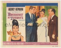 8k0815 BREAKFAST AT TIFFANY'S LC #5 1961 elegant Audrey Hepburn between Peppard & Balsam at party!